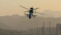 An AH-94 flying away from an urban city.