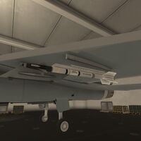 A single AIM-9 mounted to the wing of an F/A-26B.